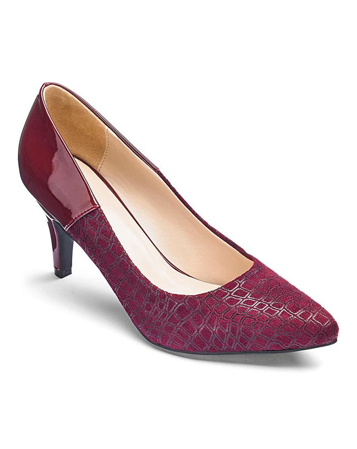 lotus embellished court shoes