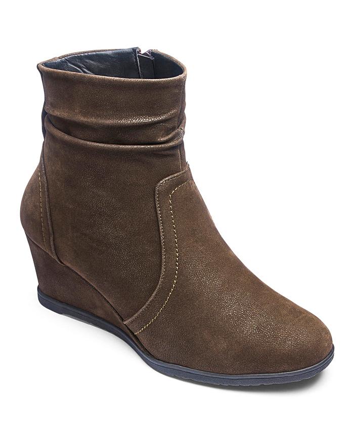 comfortable black wedge booties with arch support