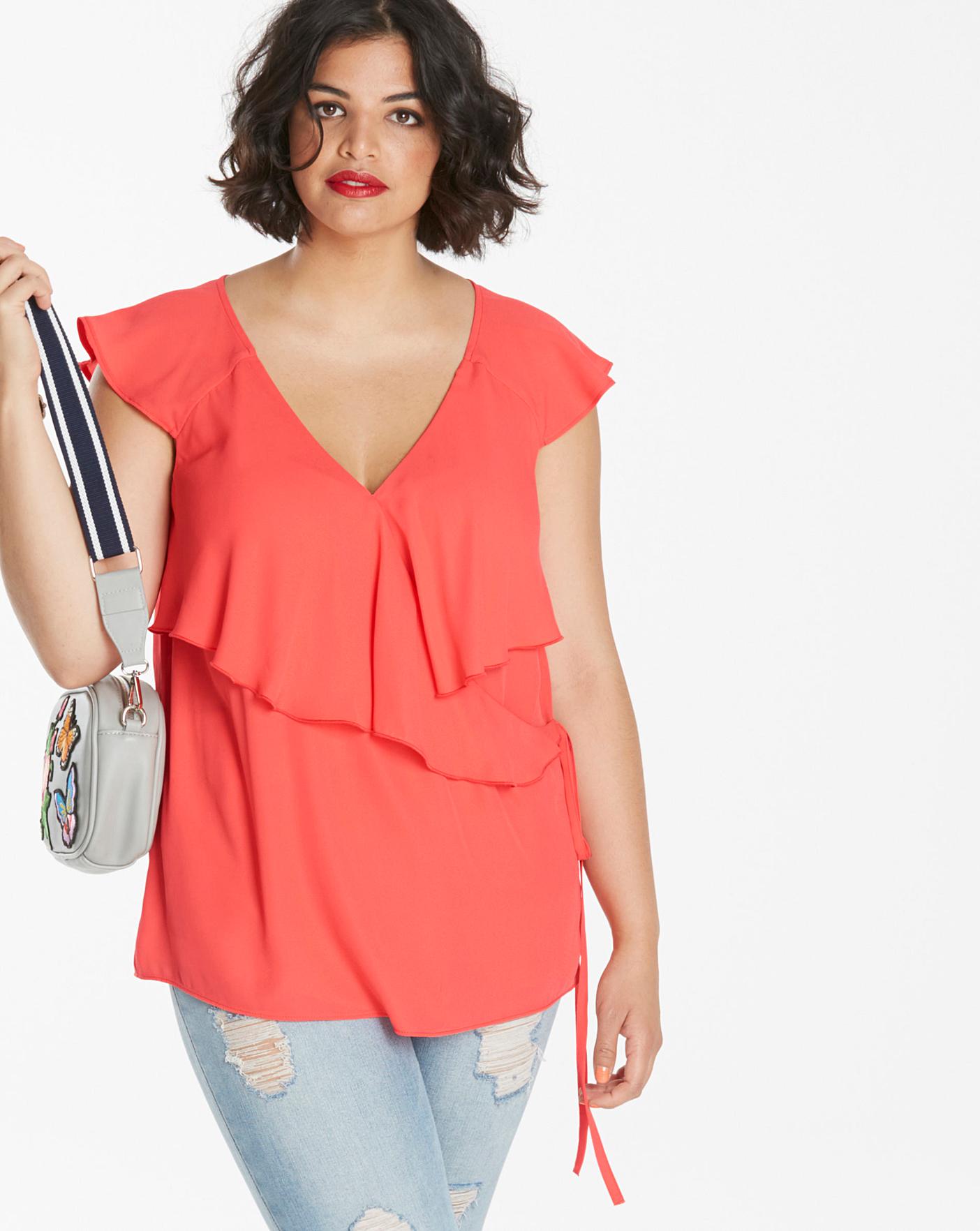 orange ruffle blouse