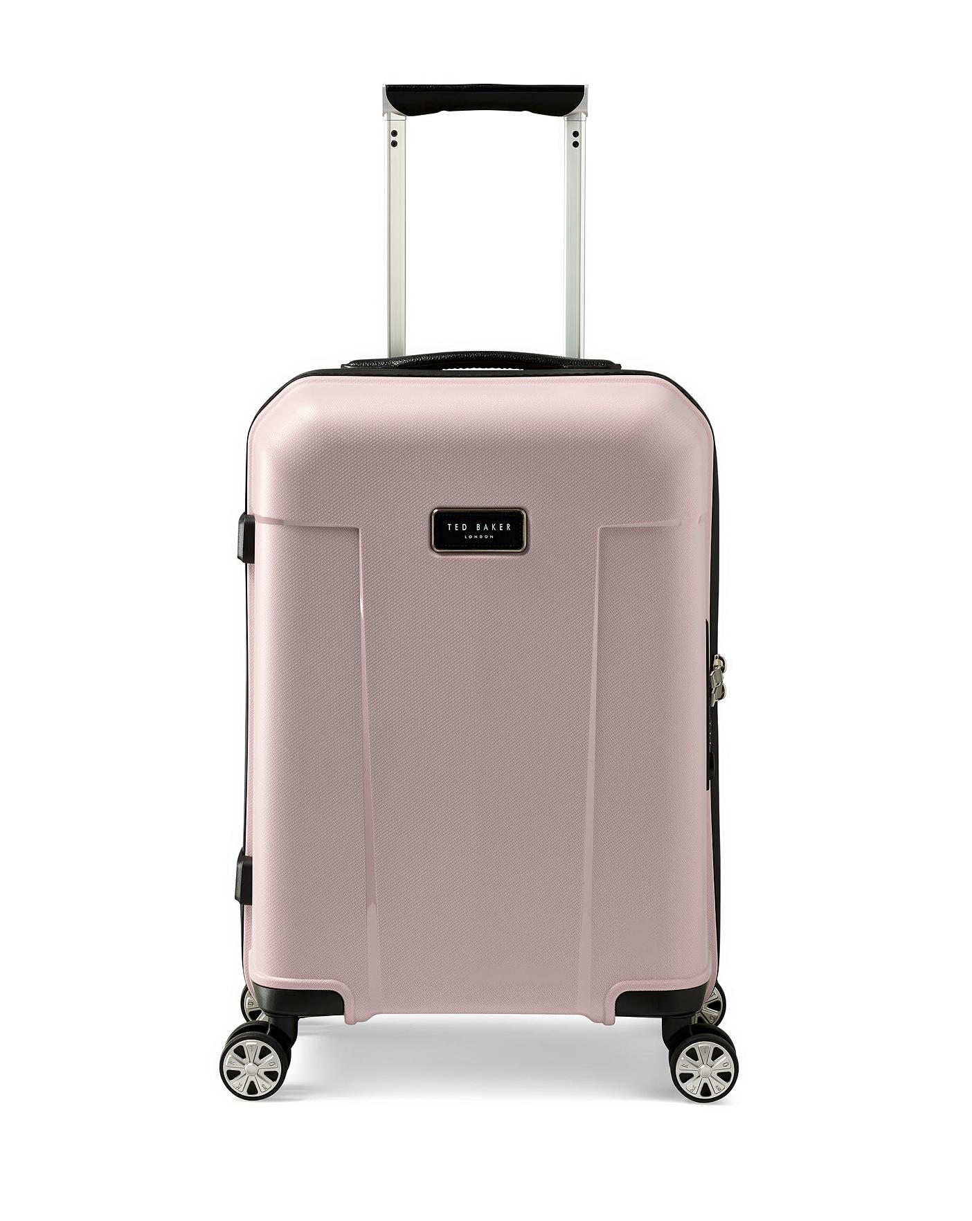 Pink and gold suitcase on sale