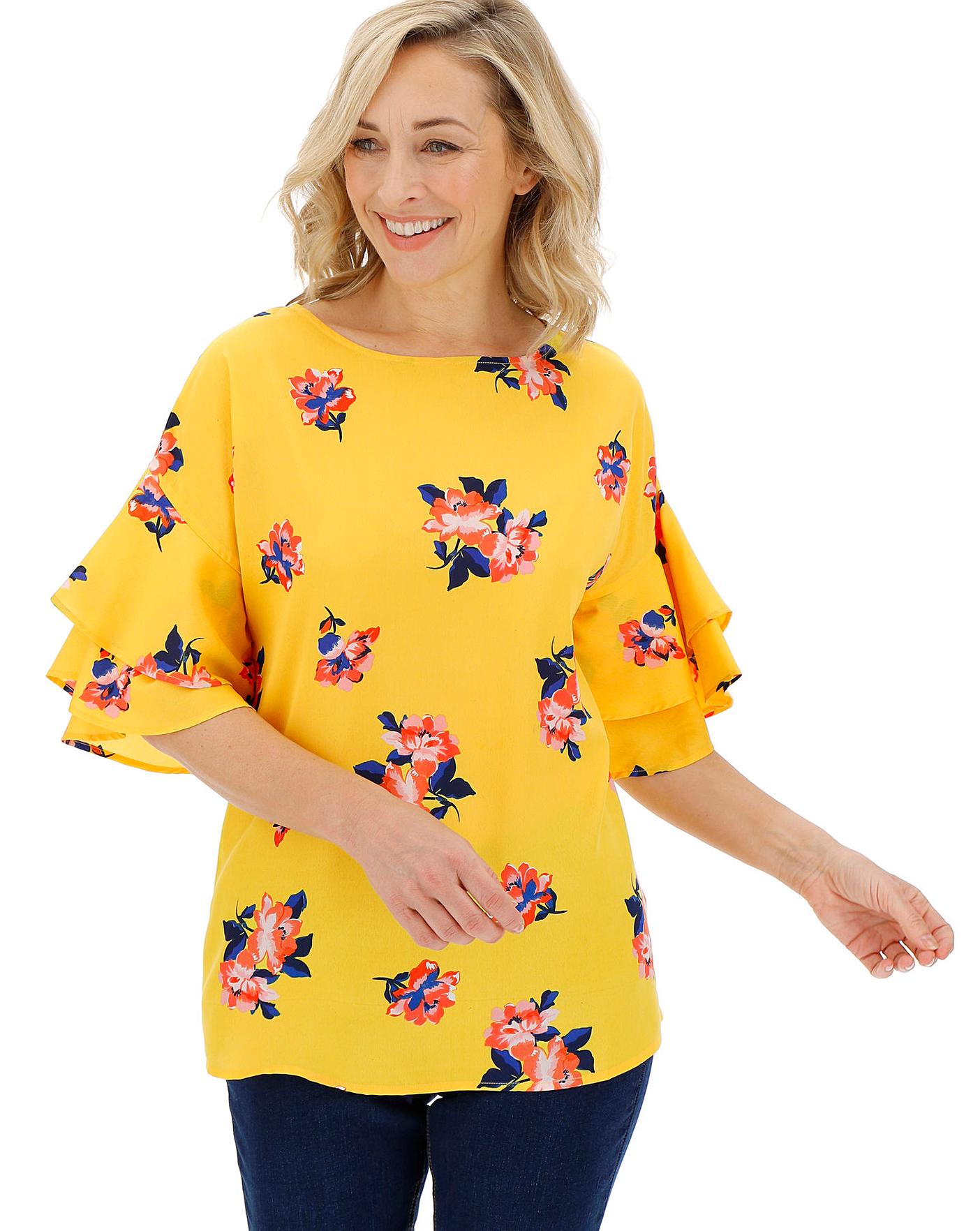 yellow floral blouse