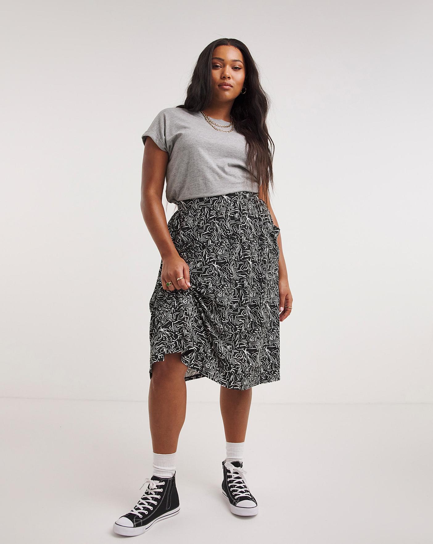 Midi skirt with top pockets in front