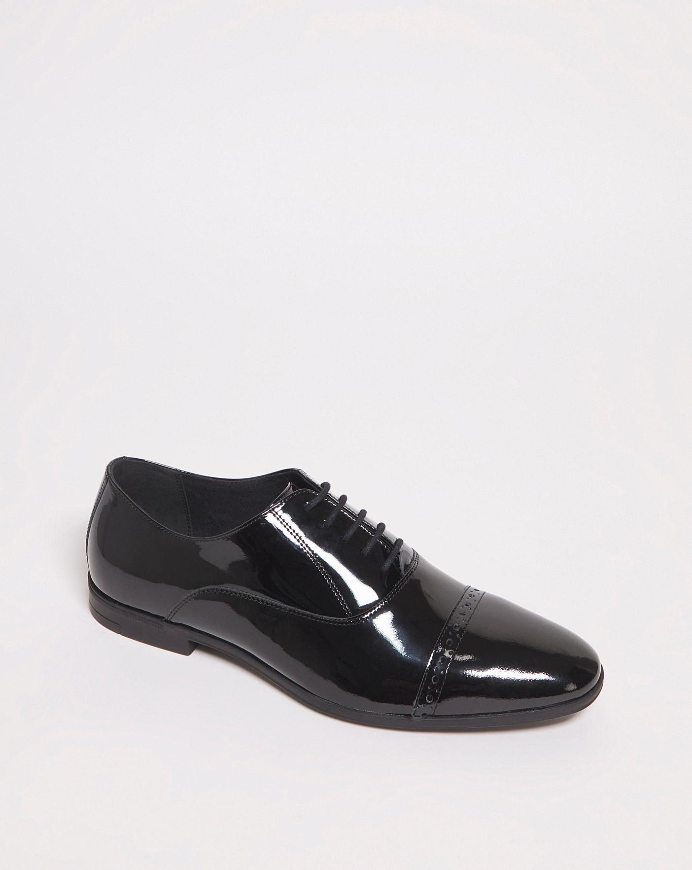 Black white patent leather sales shoes