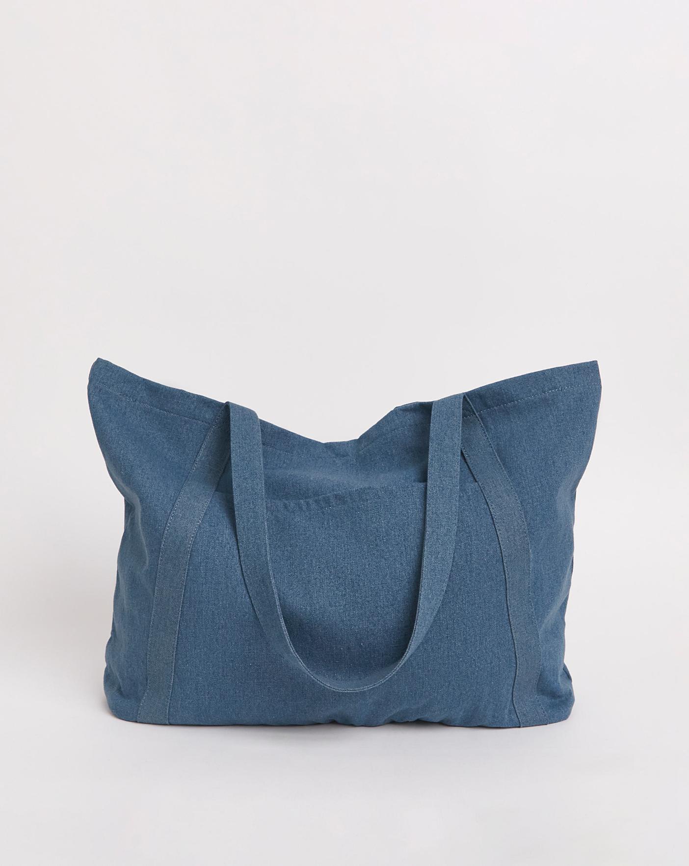 Logo jacquard denim tote bag in blue - Amiri | Mytheresa