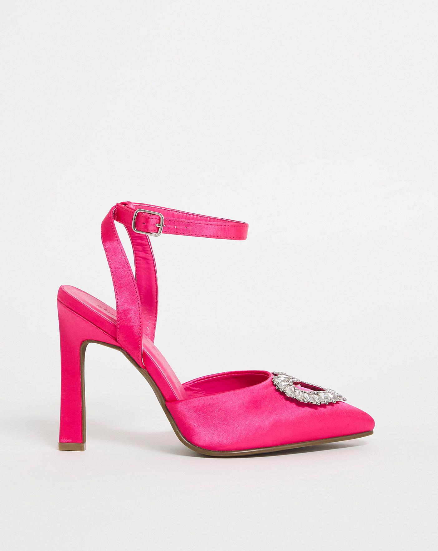 Premium Photo | Pair of stylish high heeled court shoes decorated with  glittering rhinestones