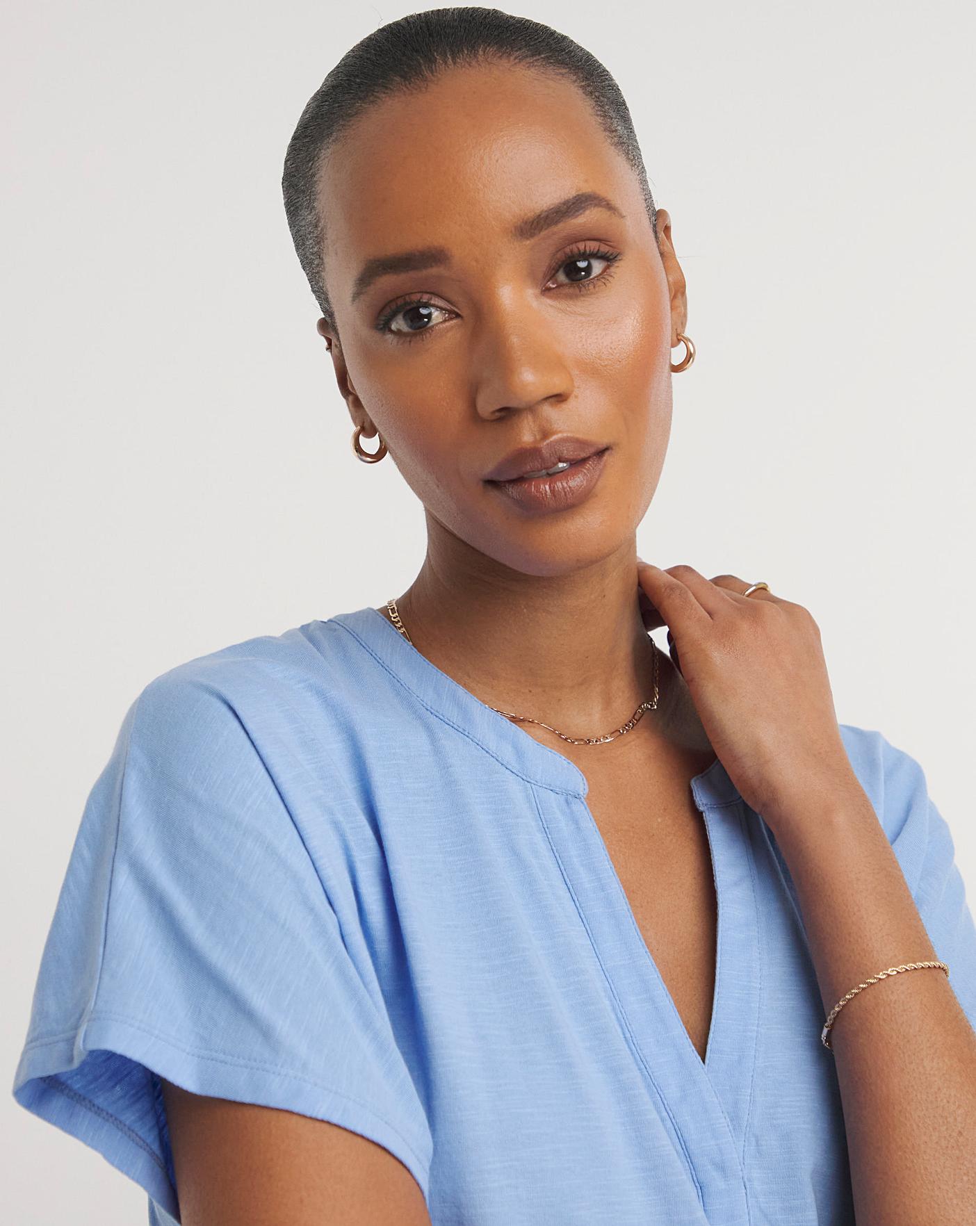 Blue V Neck Short Sleeve Peplum Hem Top | Ambrose Wilson