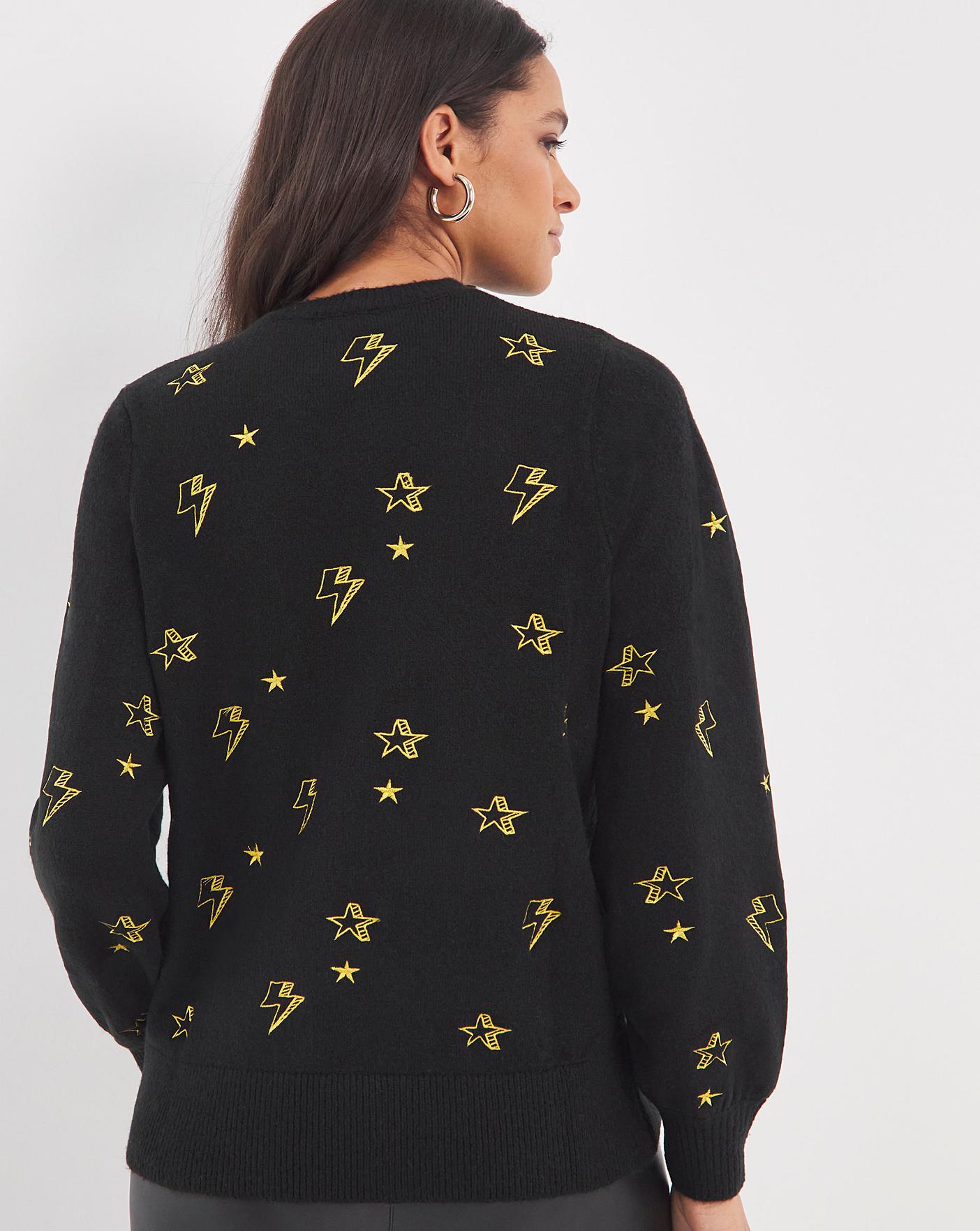 Black sweater shop with gold stars