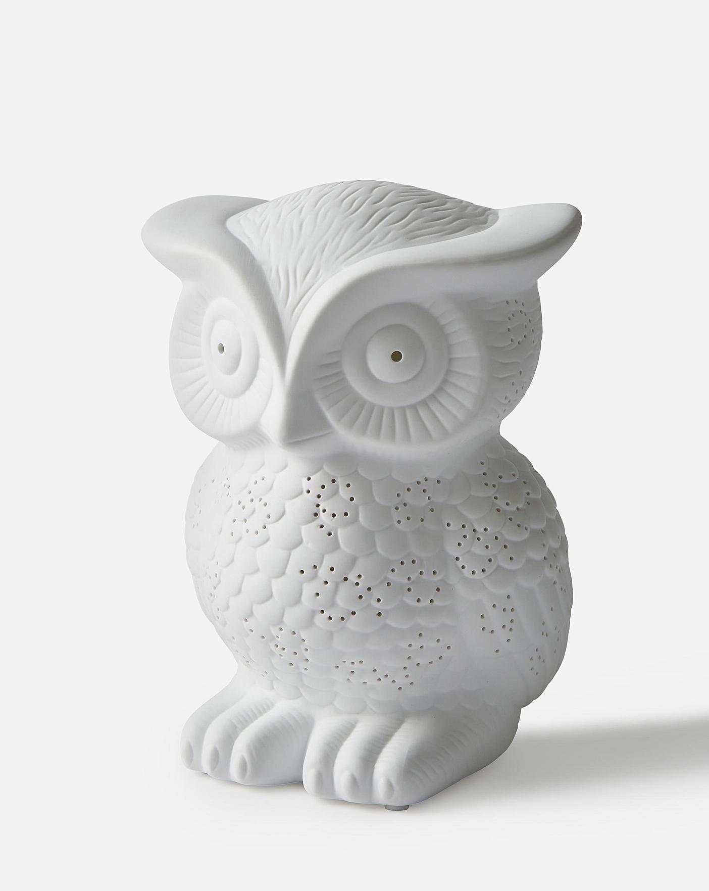 white ceramic owl night light