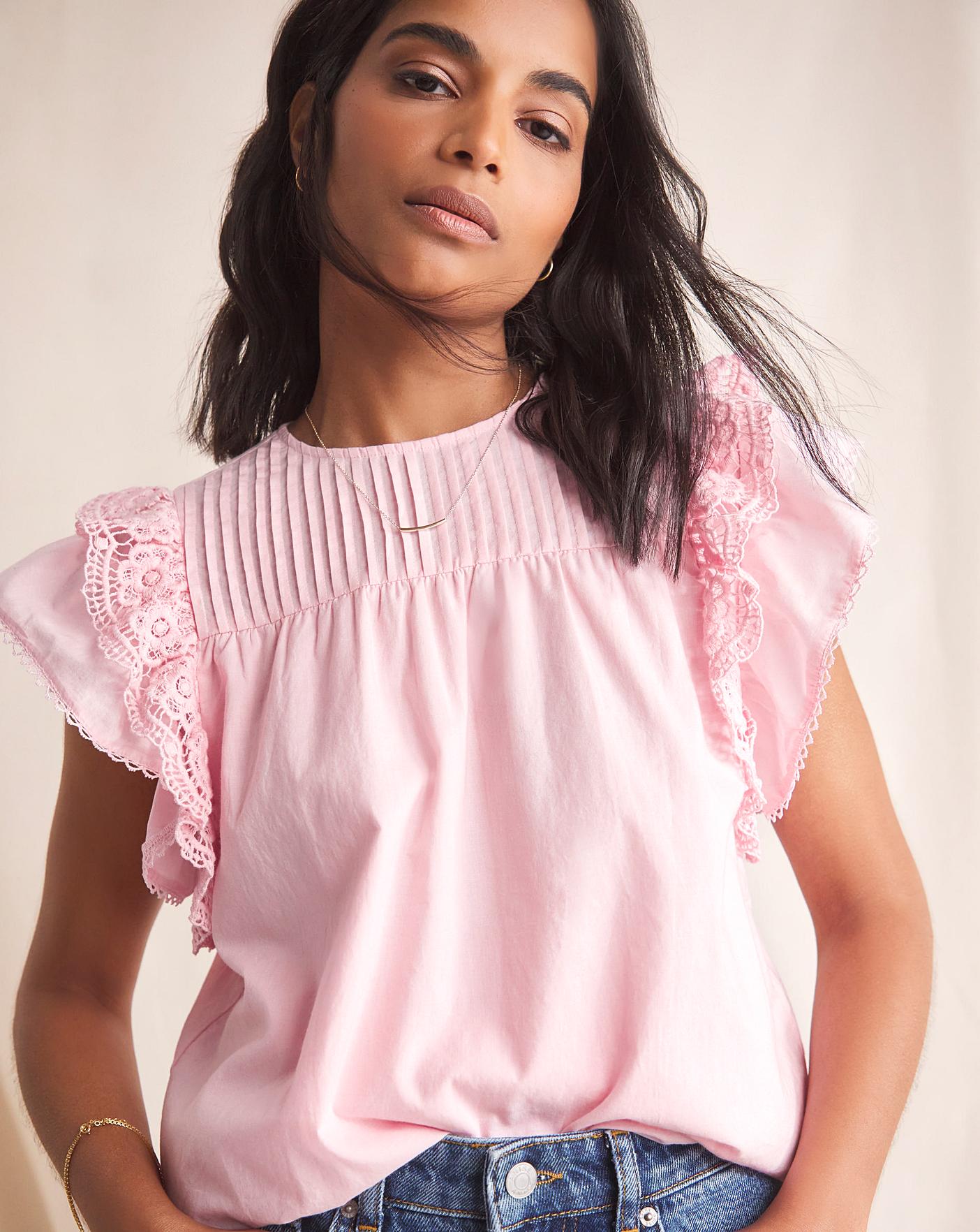 Baby pink ruffle store top