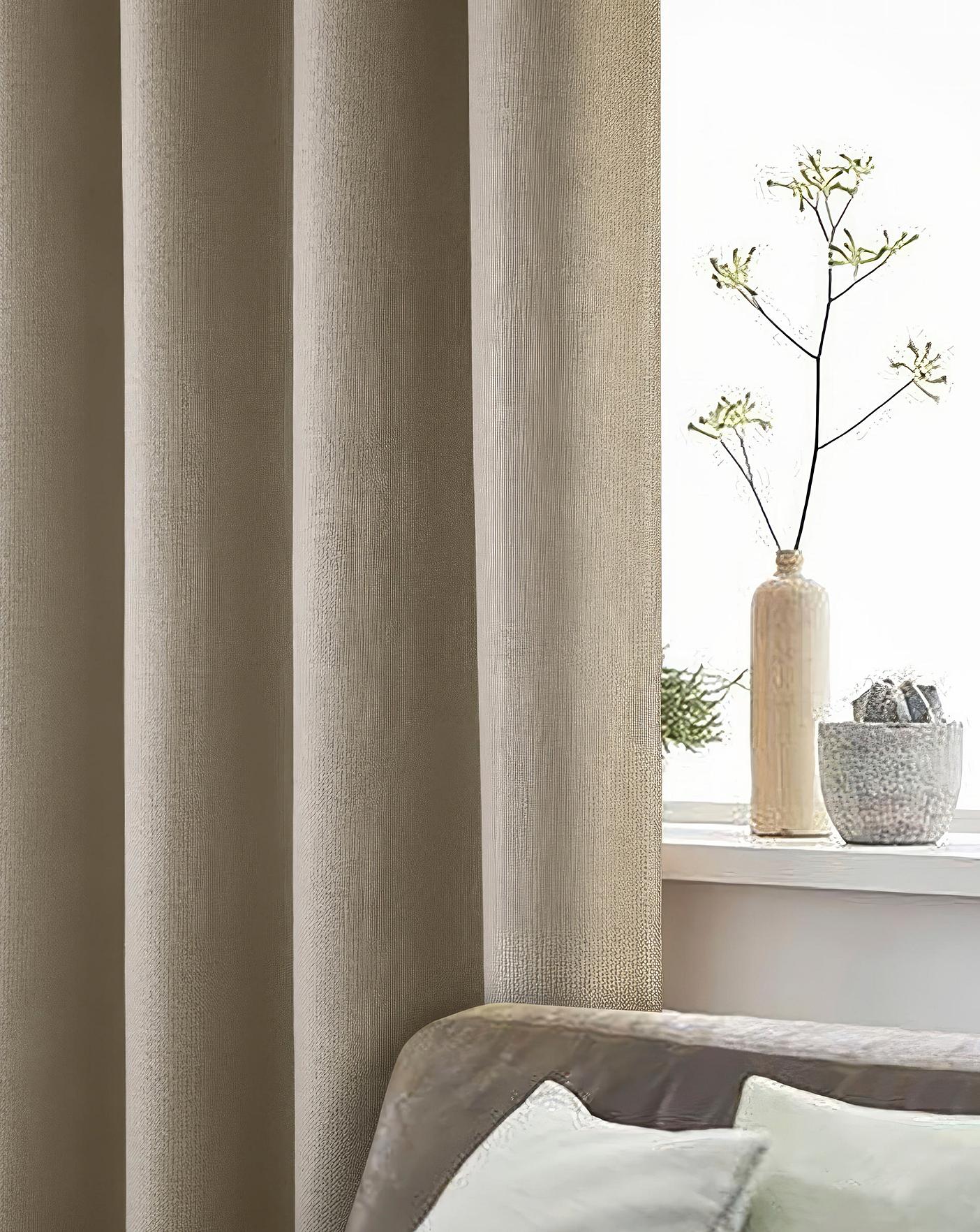 Athos Textured Blackout Eyelet Curtains | Home Essentials