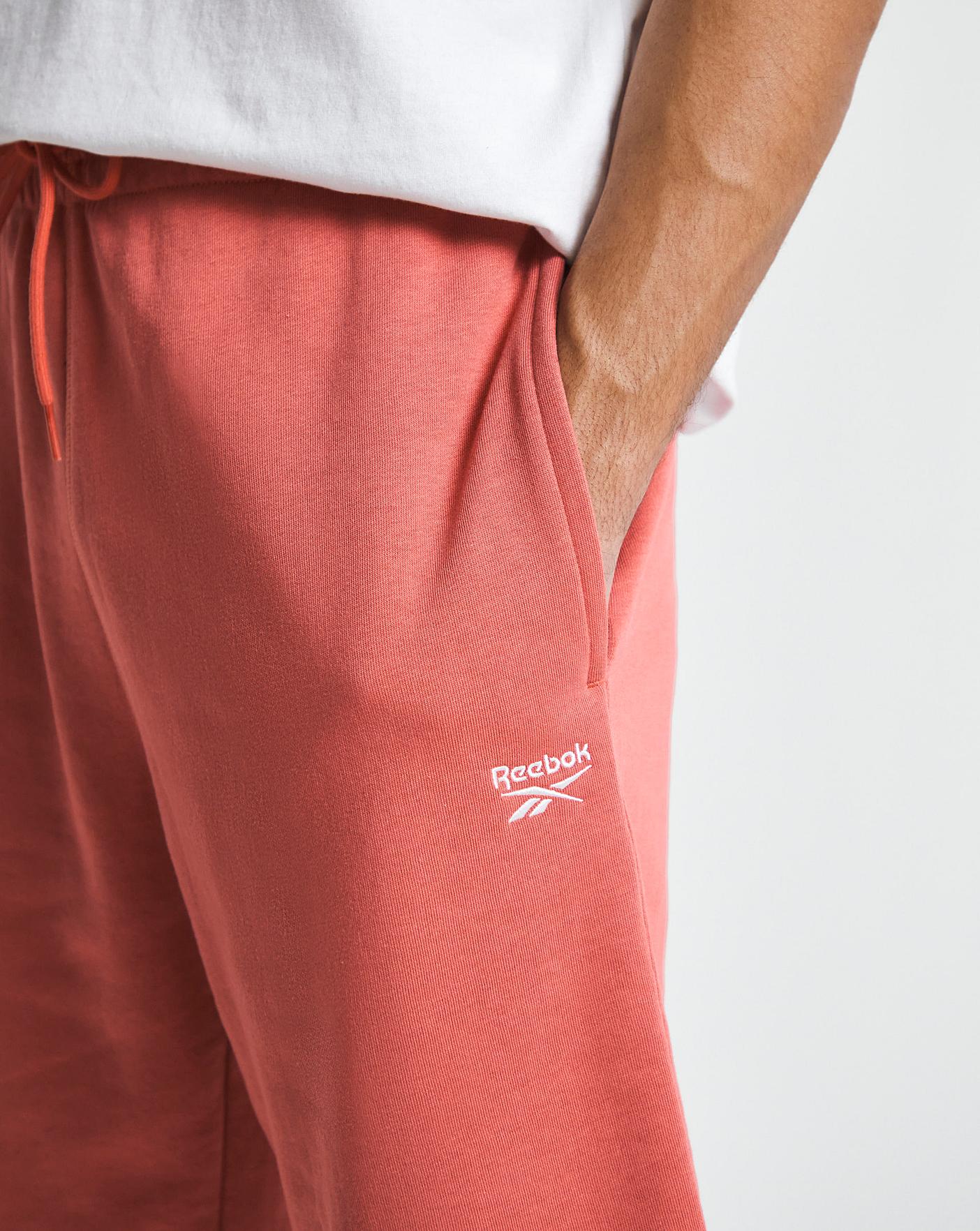 Reebok sweatpants mens clearance pink