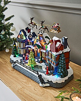 Christmas Musical Village Scene with Flying Santa and Sleigh