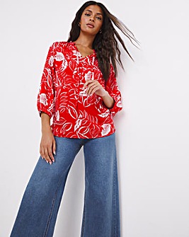 Red Floral Three Quarter Sleeve Tie Neck Blouse