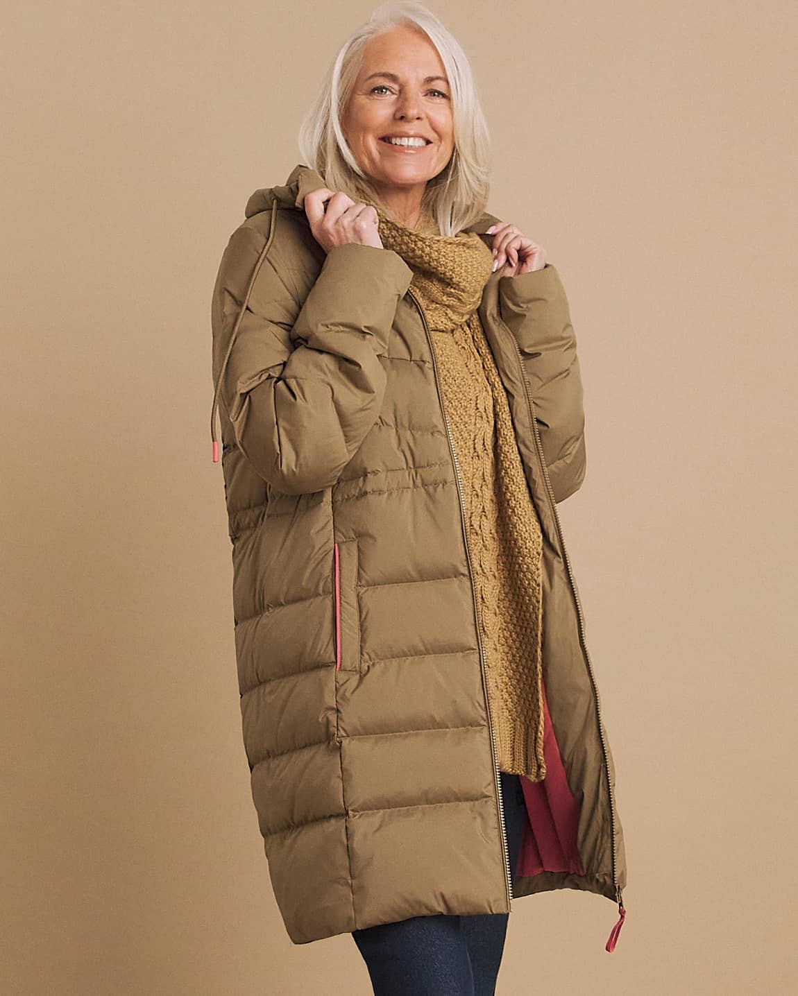 A model wearing a Julipa olive-coloured padded coat.