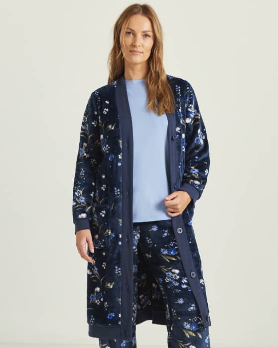 Model wearing a Julipa floral print fleece lounge set.