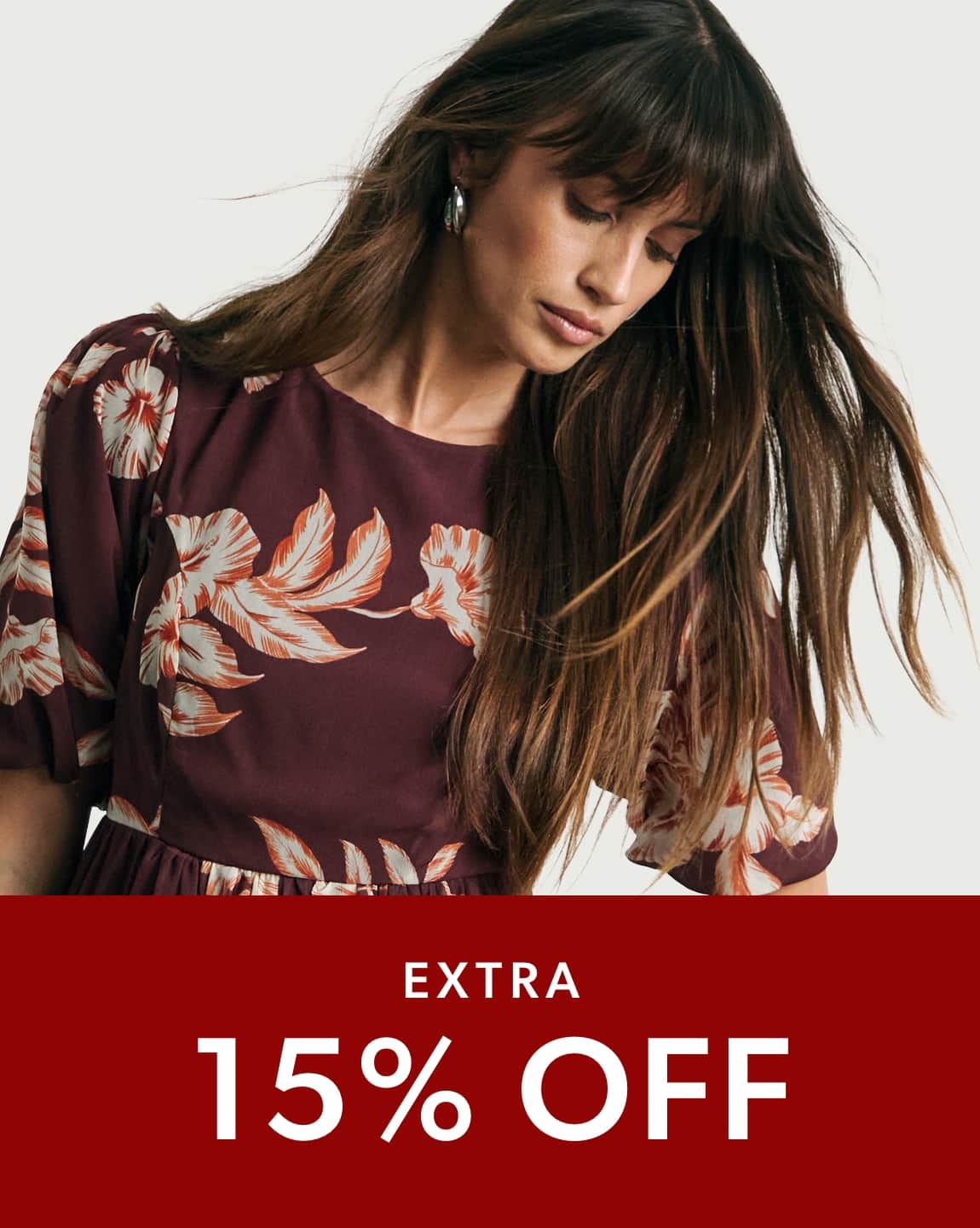 Model wearing a Joanna Hope Lace Back Midi Dress.