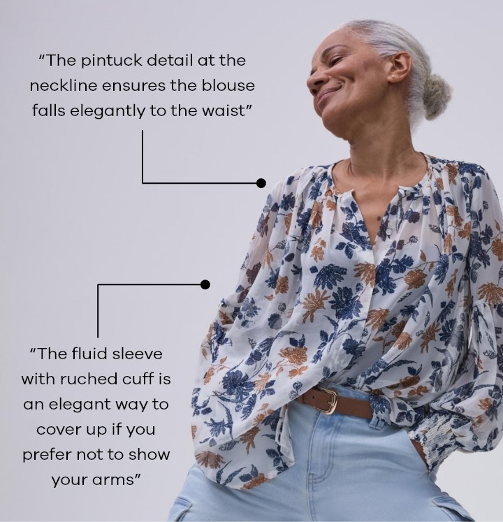 The pintuck detail at the neckline ensures the blouse falls elegantly to the waist. The fluid sleeve with ruched cuff is an elegant way to cover up if you prefer not to show your arms.