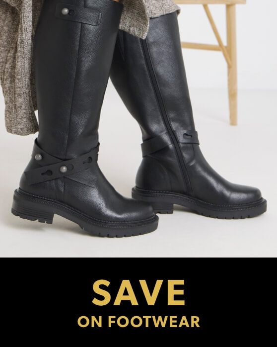 Promotional banner showing a pair of black, knee-high leather boots with chunky soles and strap details.